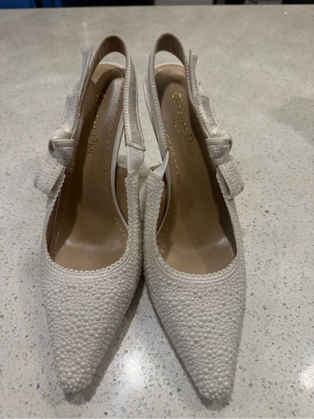 Designer inspired cream heels
